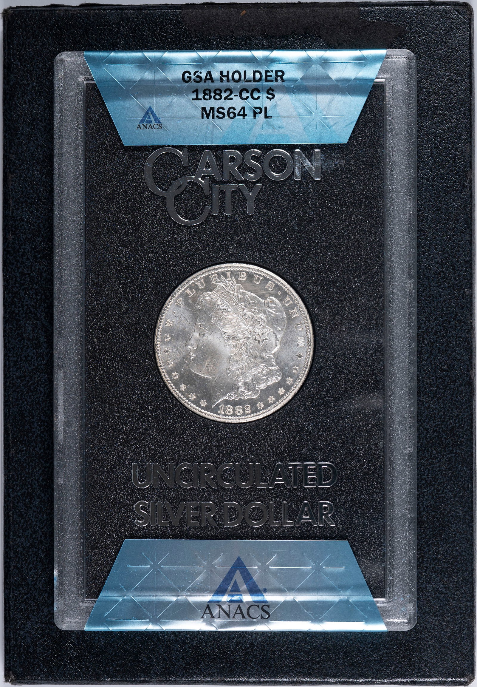 ANACS MS-64 PL 1882-CC Morgan Dollar: Brilliant white with noticeably mirrored fields. Housed in an ANACS banded GSA holder.