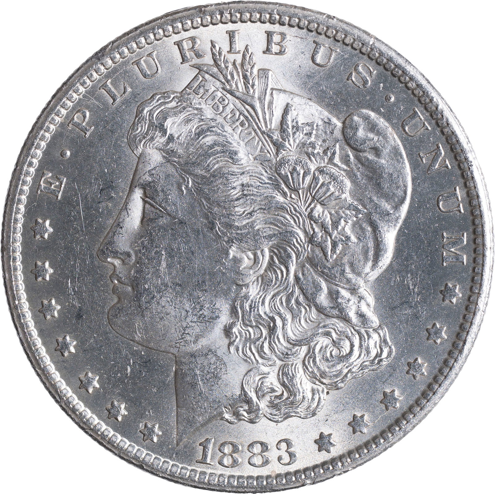 BU-60 1883-CC Morgan Dollar: Brilliant and lustrous.
