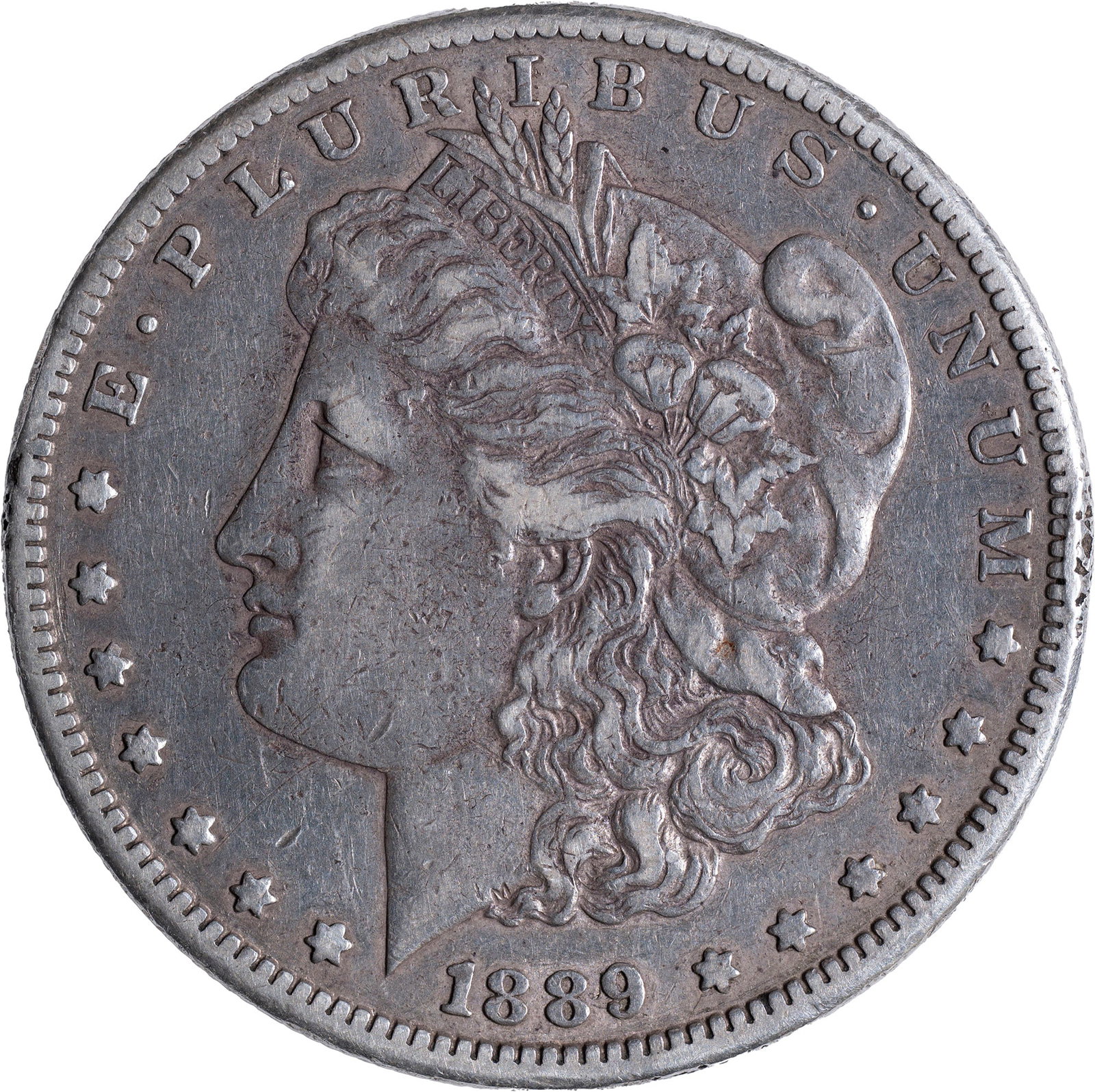 EF-45 Details 1889-CC Morgan Dollar: Medium silver-gray with golden overtones. A key date that takes a back seat to just the 1893-S rarity for desirability. Tiny rim disturbance at 3:00 on the obverse.