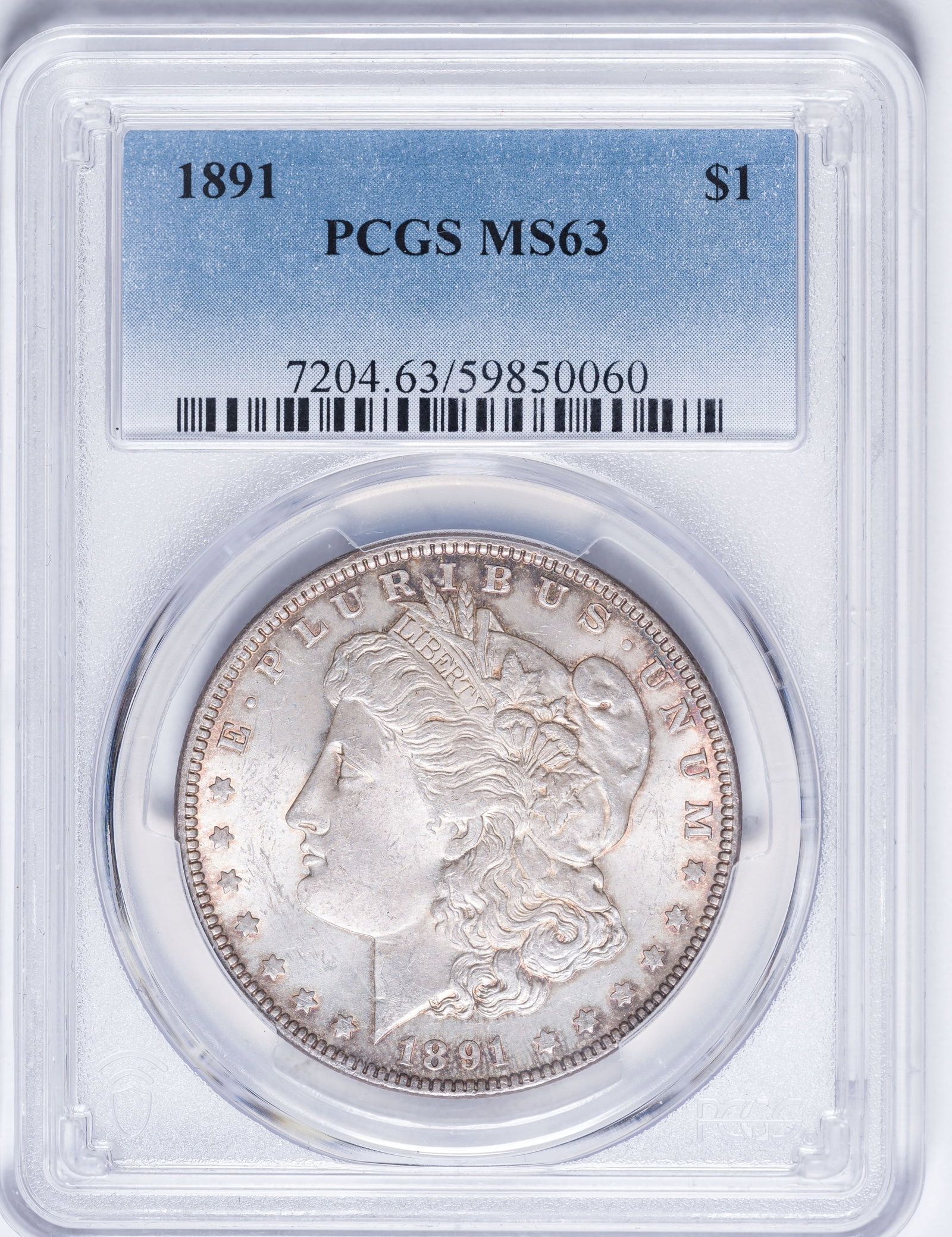 PCGS MS-63 1891 Morgan Dollar: Lustrous silken-gray surfaces offer golden-orange highlights at the rims.