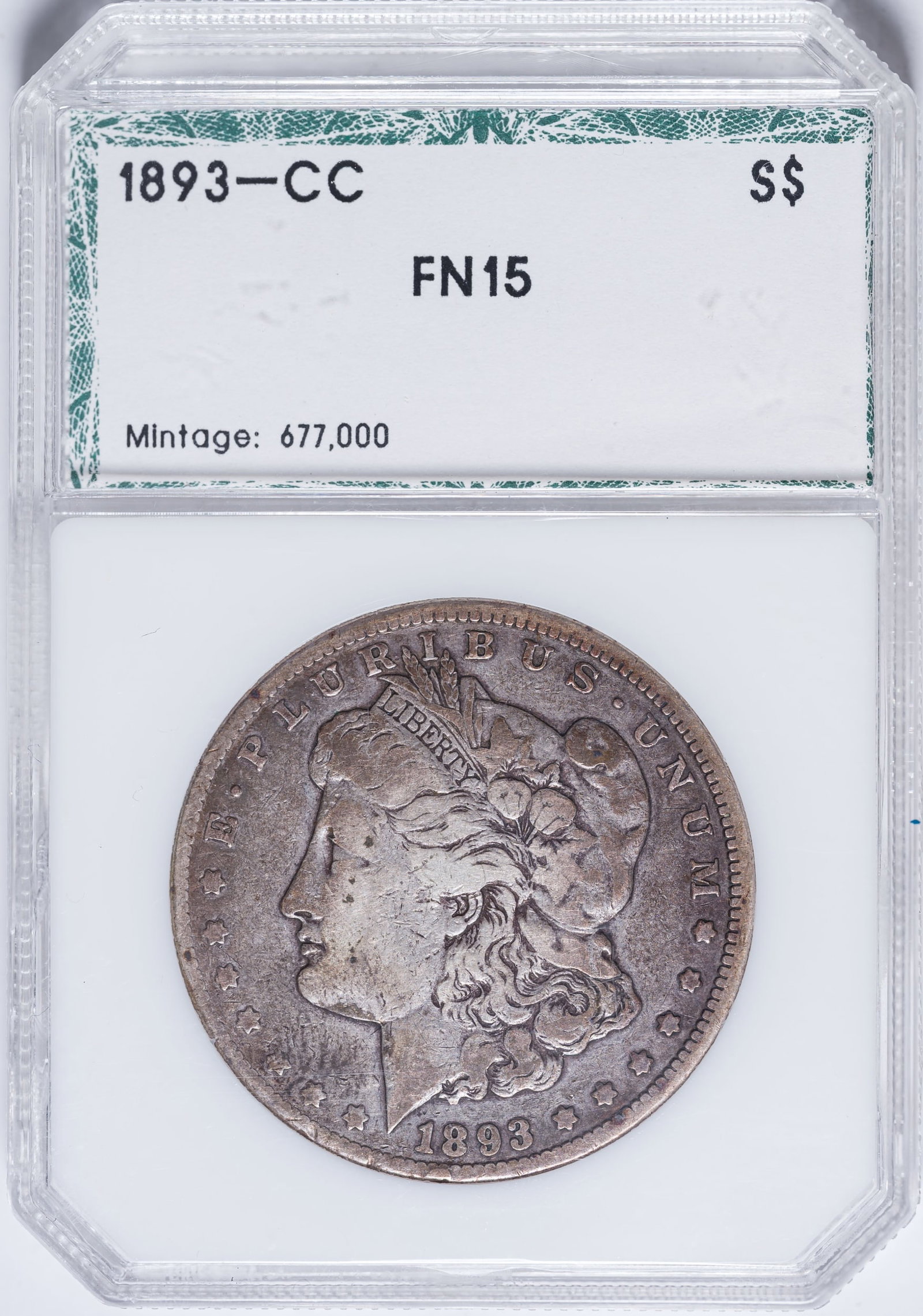 PCI Fine-15 1893-CC Morgan Dollar: We think Fine-12 is more in line. Steel-gray with deeper highlights in the protected areas.