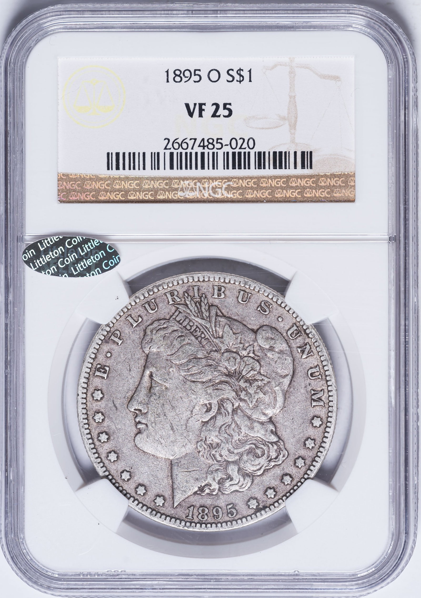 NGC VF-25 1895-O Morgan Dollar: Even silver-gray with a hint of olive toning. Mark-free despite the lengthy stay in pocket change. With a "Littleton Select" sticker.