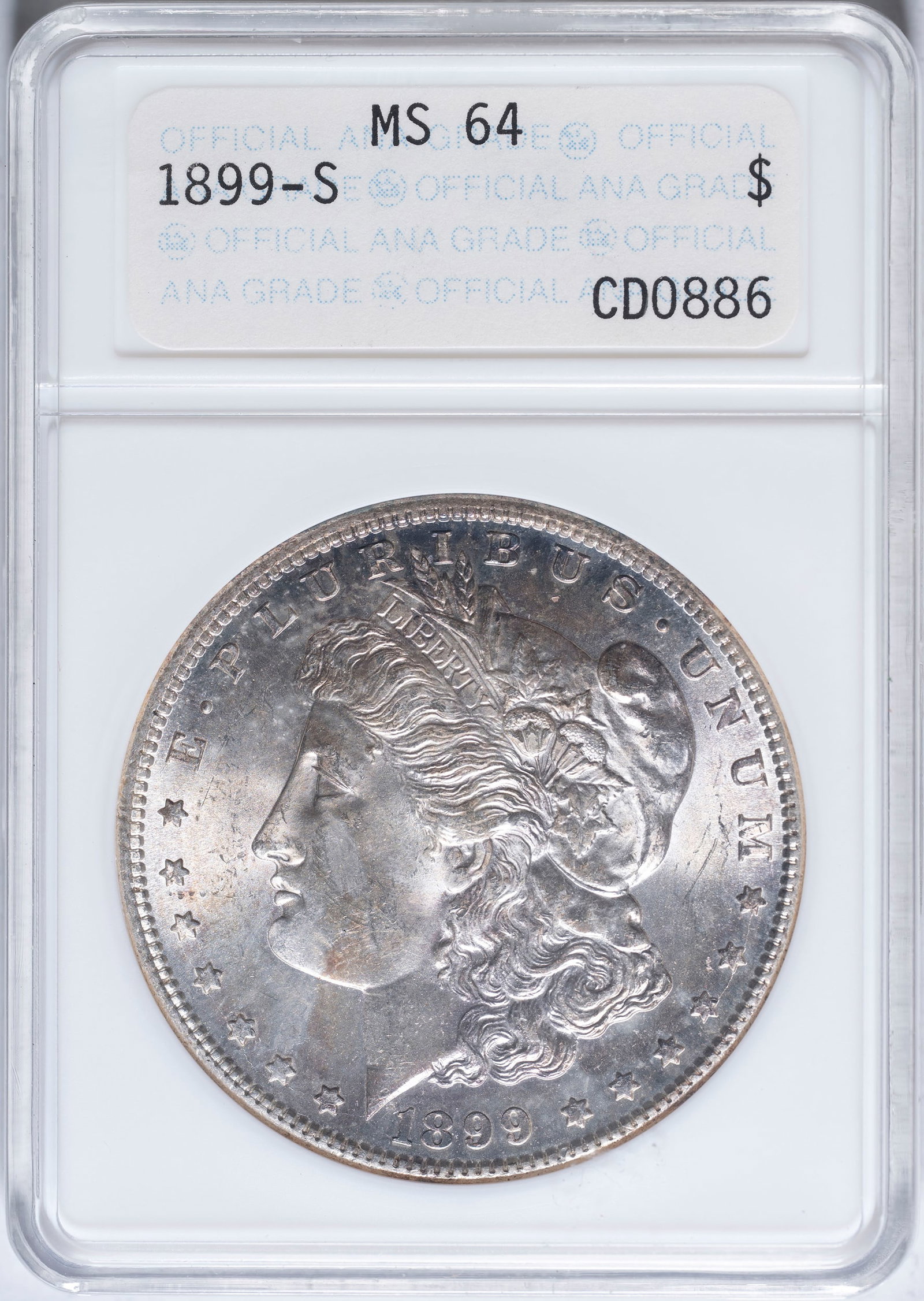 ANACS MS-64 1899-S Morgan Dollar: Shows excellent cartwheel luster with some light, somewhat mottled tone.