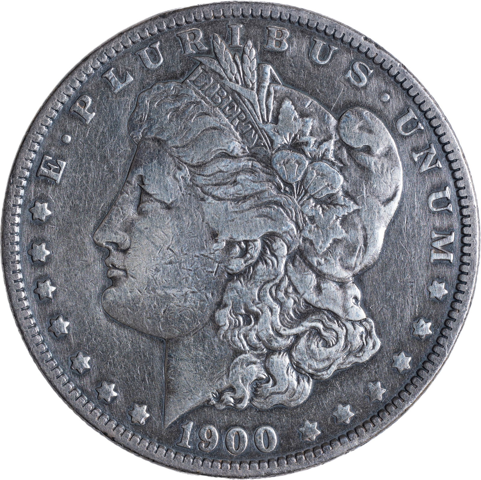 VF Details 1900-O/CC Morgan Dollar: Cleaned at some point, still a trifle bright. Bold overmintmark details.