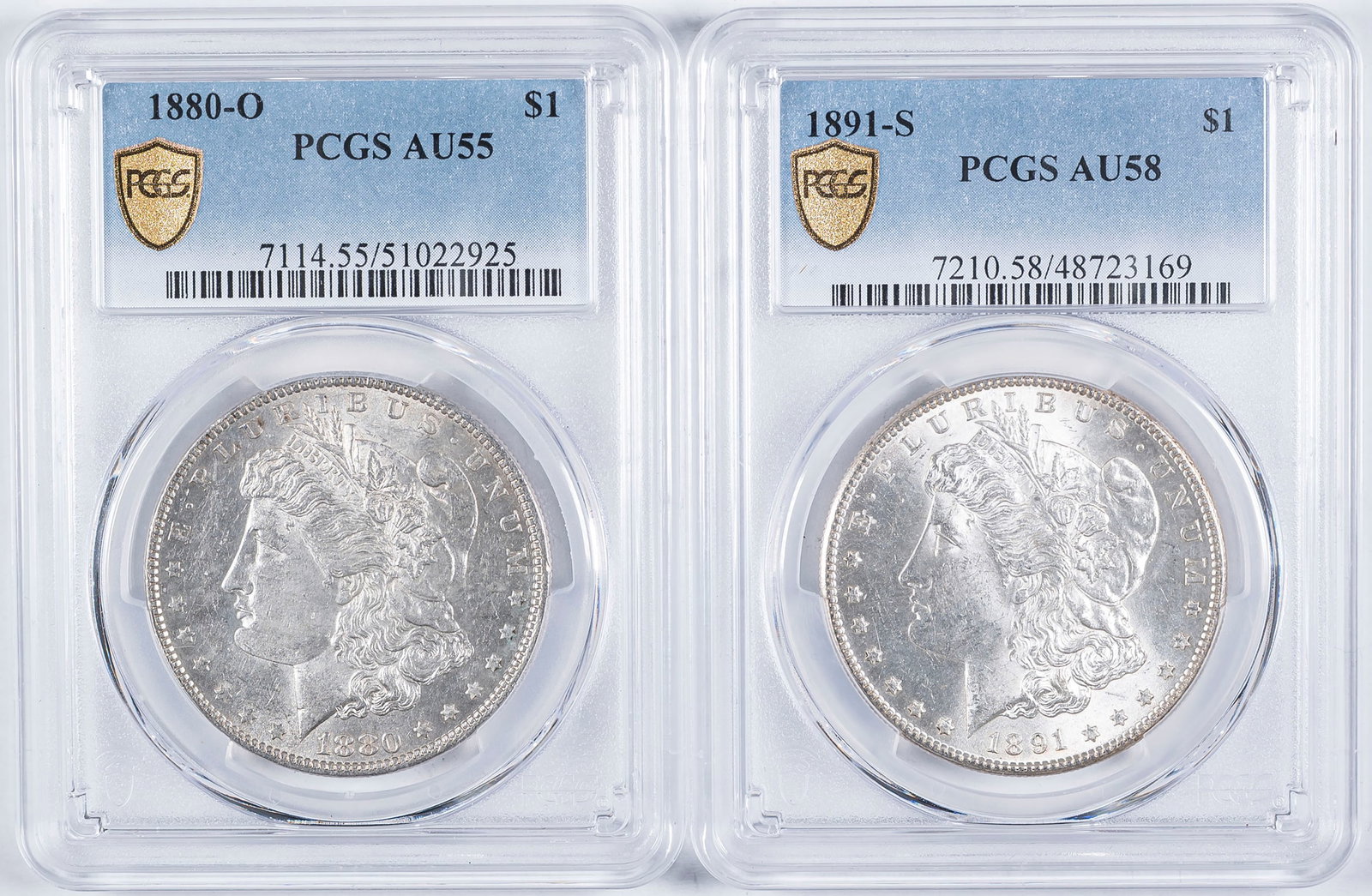 PCGS-Certified AU Morgan Dollar Pair: Includes: 1880-O AU-55; and 1891-S AU-58. Both brilliant and lustrous. (Total: 2 pieces)