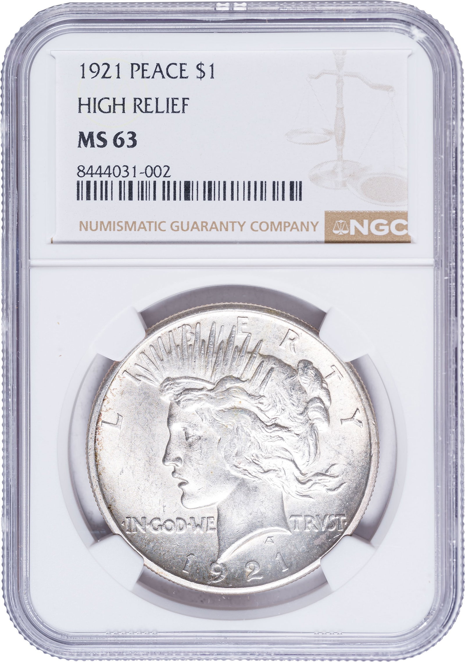 NGC MS-63 1921 Peace Dollar: A satiny specimen with lively luster and a whisper of pale golden toning.