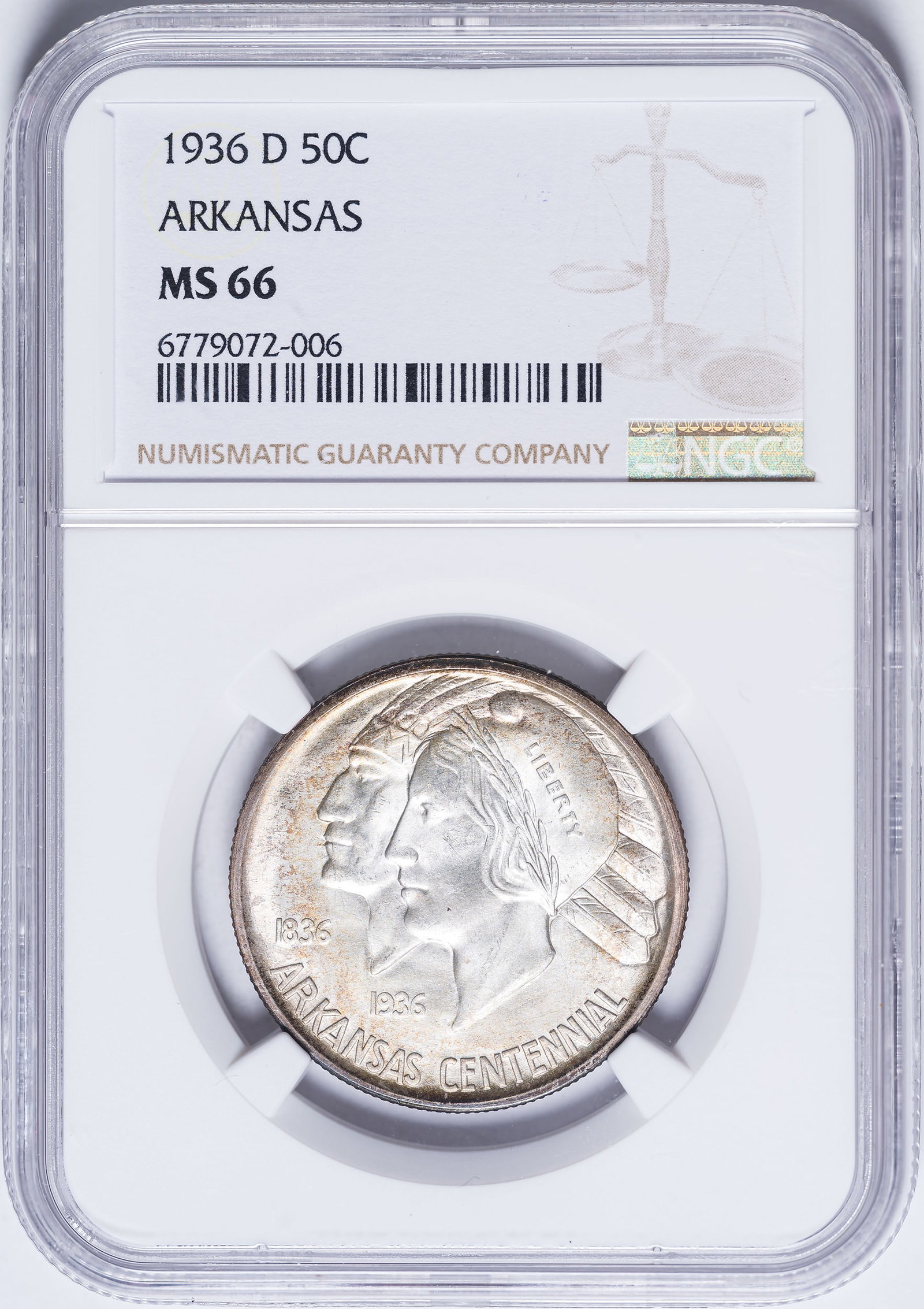 NGC MS-66 1936-D Arkansas Half Dollar: A frosty and lustrous mattelike Gem with golden highlights at the peripheries.