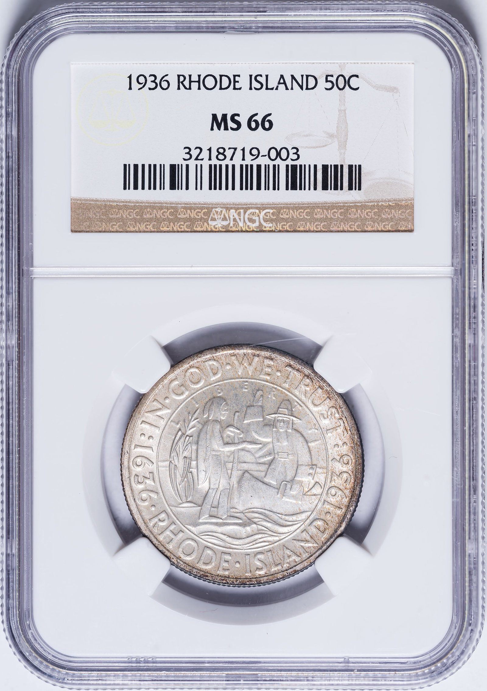 NGC MS-66 1936 Rhode Island Half Dollar: Satiny and lustrous with glowing golden highlights at the rims.