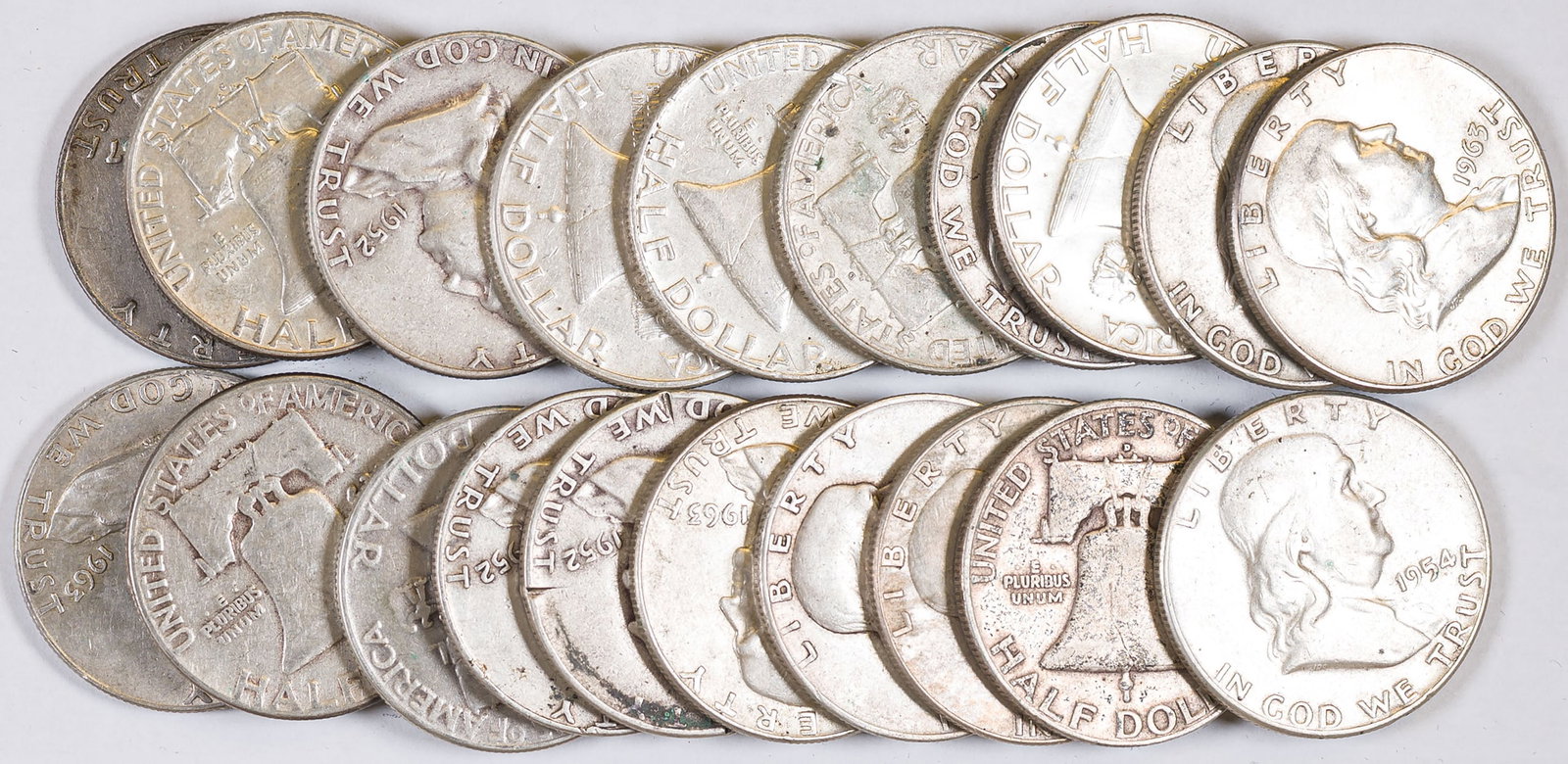 Roll Of Circulated Franklin Half Dollars: Includes mixed dates in typical circulated condition.