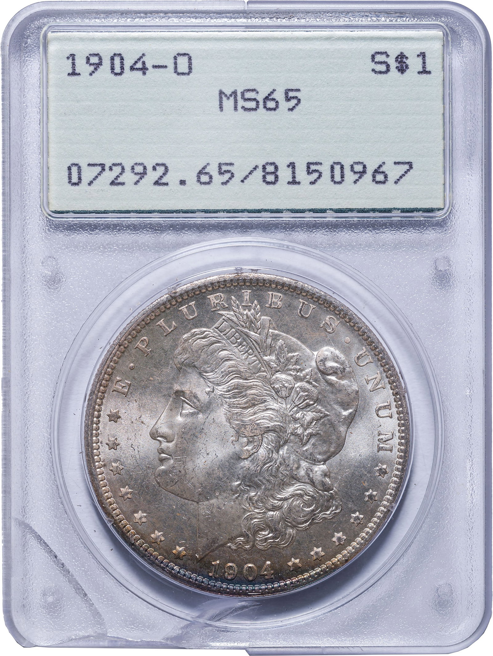 PCGS MS-65 1904-O Morgan Dollar: Satiny and brilliant, and not far off a finer grade to our eyes. A whisper of toning is seen at the date. In an old-style green label PCGS "Rattler" holder which unfortunately has a crack.