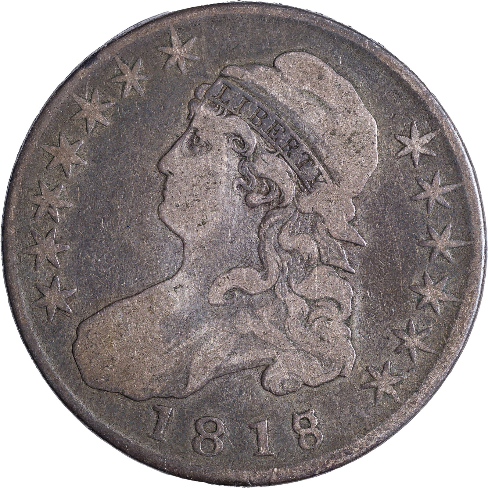 F-12 1818/7 Bust Half Dollar: Large 8. A nice original example.