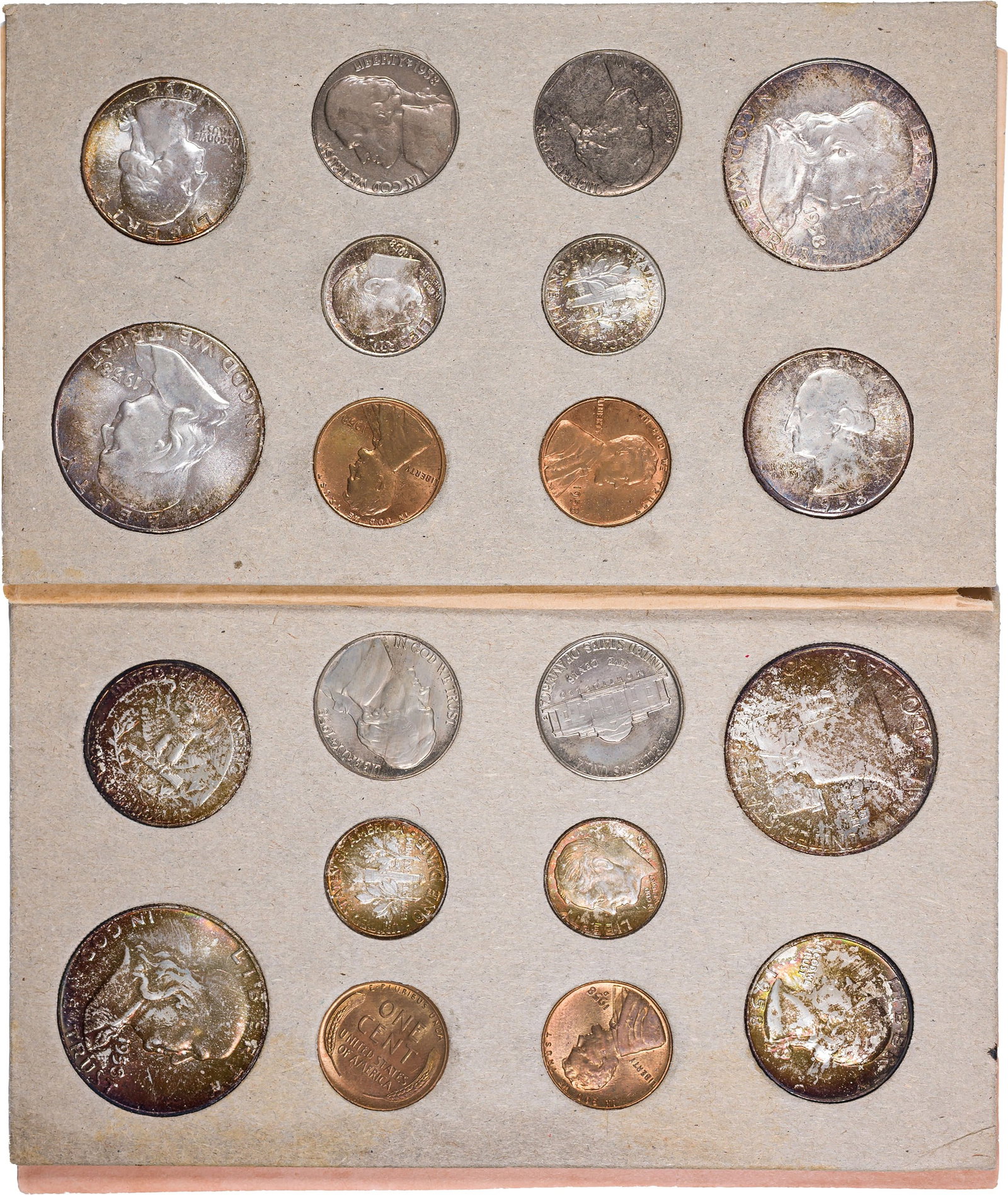 Original 1958 Mint Set: A gem set still housed in its original mint issued cards and envelope. Most of the silver coins are nicely toned.