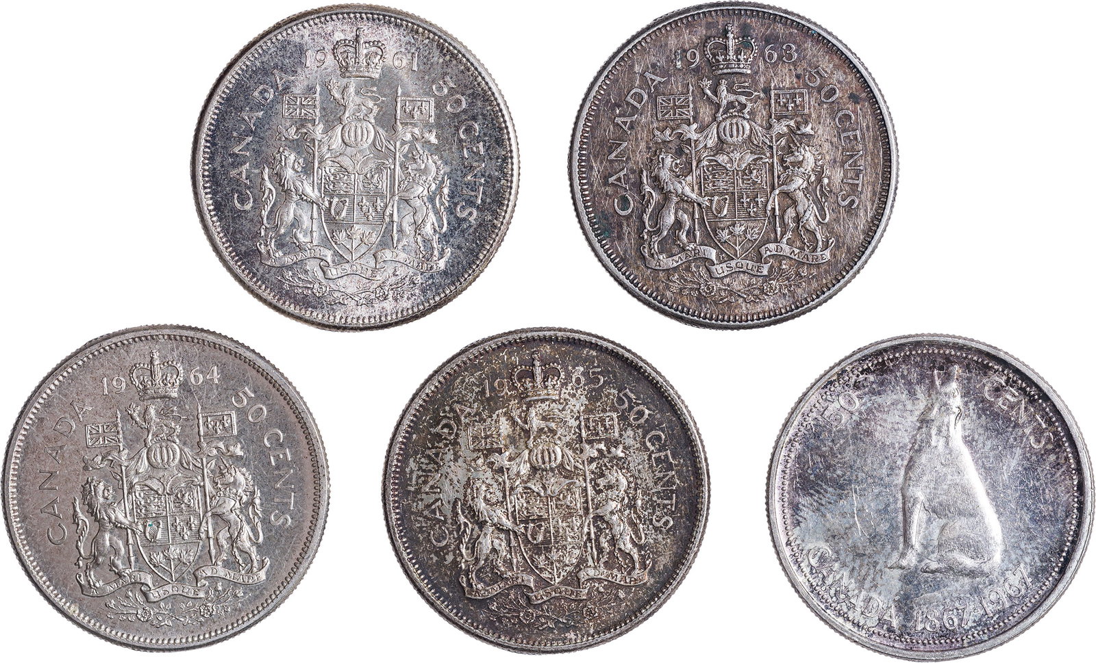 5 Different Silver Canadian Half Dollars: Includes 1961, 1963, 1964, 1965 & 1967. All are mint state except for the 1963 which is AU. (Total: 5 Pcs)