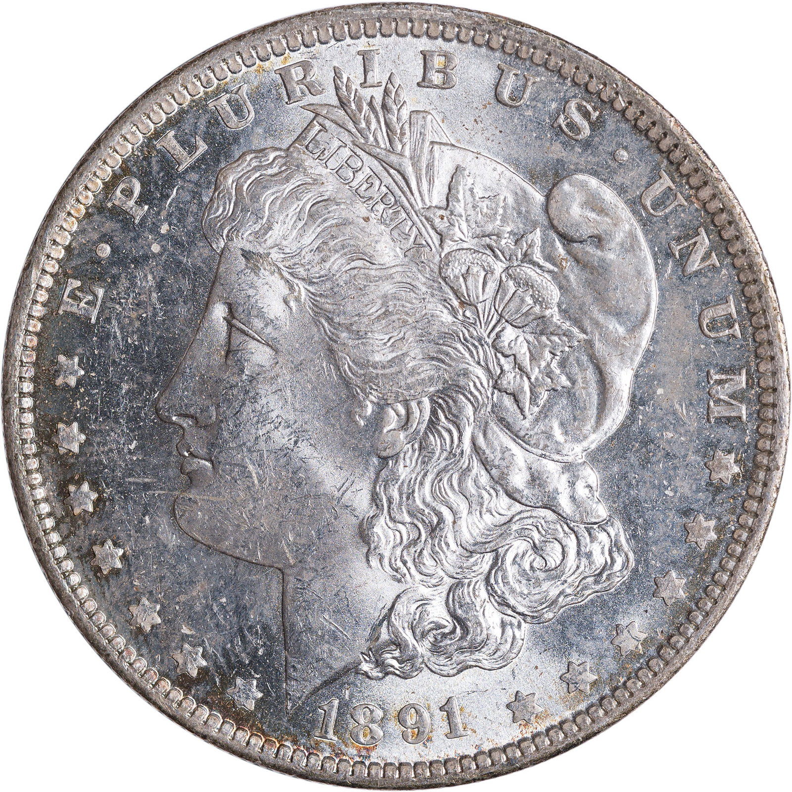 MS-60+ 1891-O Morgan Dollar: Brilliant and lustrous with a pale golden obverse periphery.