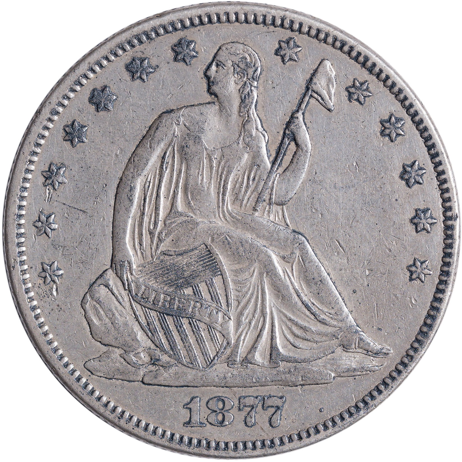AU Details 1877 Seated Half Dollar: Sharply detailed with grey color. Shows evidence of a past cleaning.