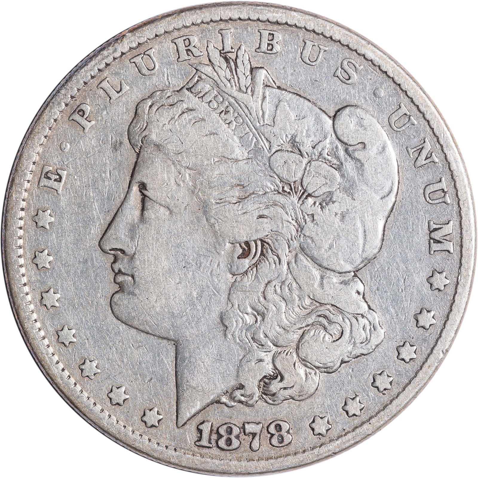 VF-20 1878 8 TF Morgan Dollar: Evenly worn golden-gray surfaces yield few marks of any measure.