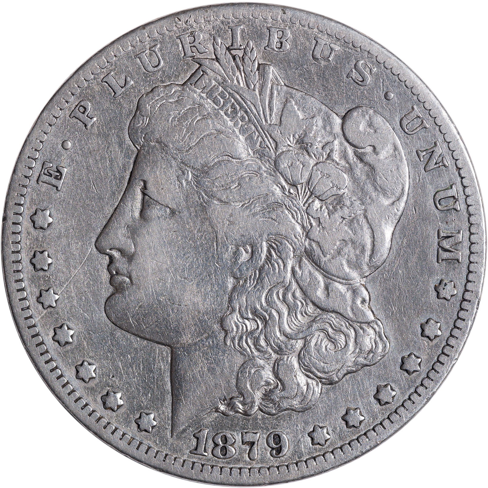 VF-25 Details 1879-CC Morgan Dollar: Normal Mintmark. Cleaned long ago, old obverse scratch from nose to rim through star 5.