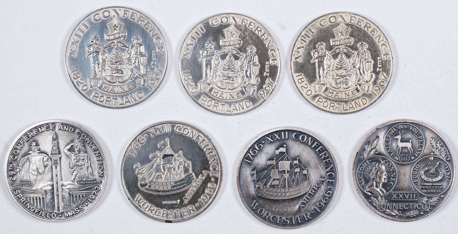 Seven Sterling Silver NENA Medals: Includes: 1966 Worcester, Massachusetts (2); 1967 Portland, Maine (3); 1971 Hartford, Connecticut with original NENA envelope; and 1973 Springfield, Massachusetts with original envelope. Just shy of