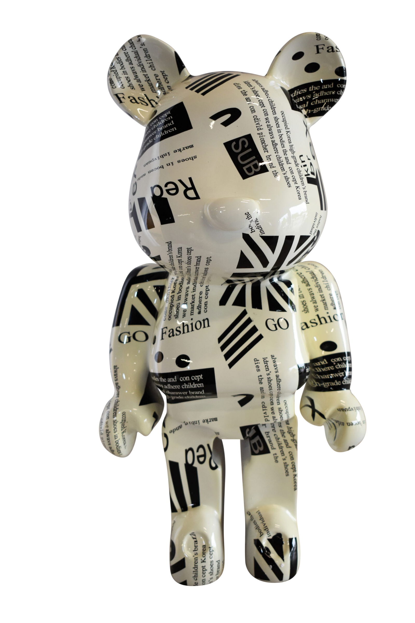 Medium Bearbrick Black and White Unique Patterned Resin Statue 9" x 8" x 17"H: Mimicking the popularity and uniqueness of the bearbrick trend, this statue combines this design with a unique black and white pattern to bring a distinctive and modern medium sized resin statue to yo