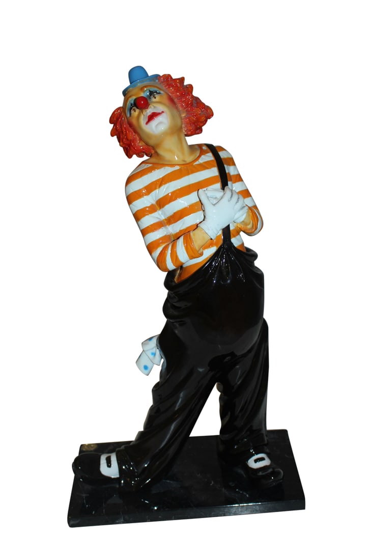 Clown - small Bronze Statue - Size: 12"L x 6"W x 23"H.: Decorative Bronze Loveable Clown statue standing on a black marble base. The statue is created using the Lost Wax Cast Bronze method with great attention to the detail of a real clowns colors and clot