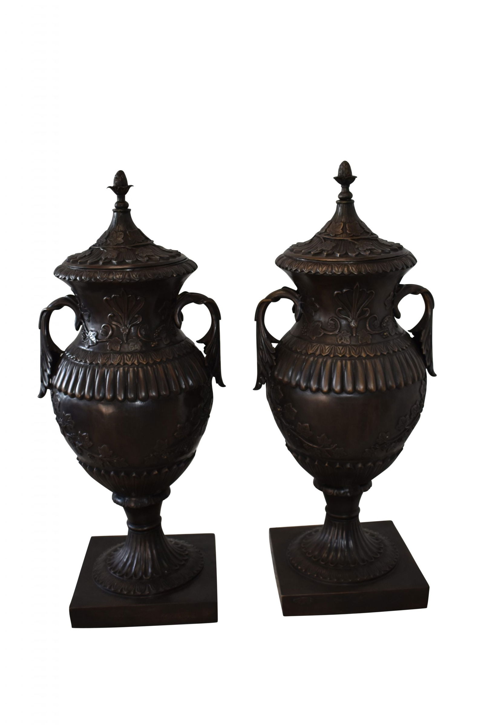 A Pair Of Urns or Vases Made of Pure Bronze Size: 21" x 18" x 47"H: This pair of Urns carries beauty in the history behind it and detail of the work itself. This set would look wonderful in any room in need of intense art. This fine and unique abstract was casted usin