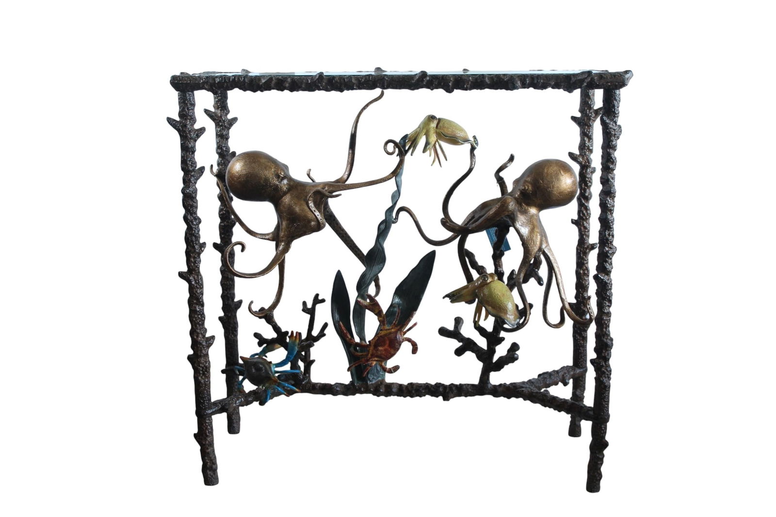 Aluminum Octopus Console Table with Glass Top Coastal Art 34" x 15" x 33"H: Handcrafted aluminum console table featuring two sculpted octopus forms and sea life details beneath a clear glass top. The textured frame shows artisanal hammering that adds depth and character for a