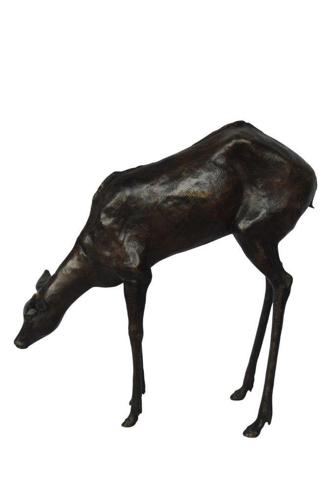 Life Size deer bronze statue - Size: 33"L x 9"W x 34"H.: This beautiful bronze sculpture of a grazing deer will impress any visitors to your home. The elegance of the deer grazing will fit well anywhere in your home or patio. This is a particularly great gi