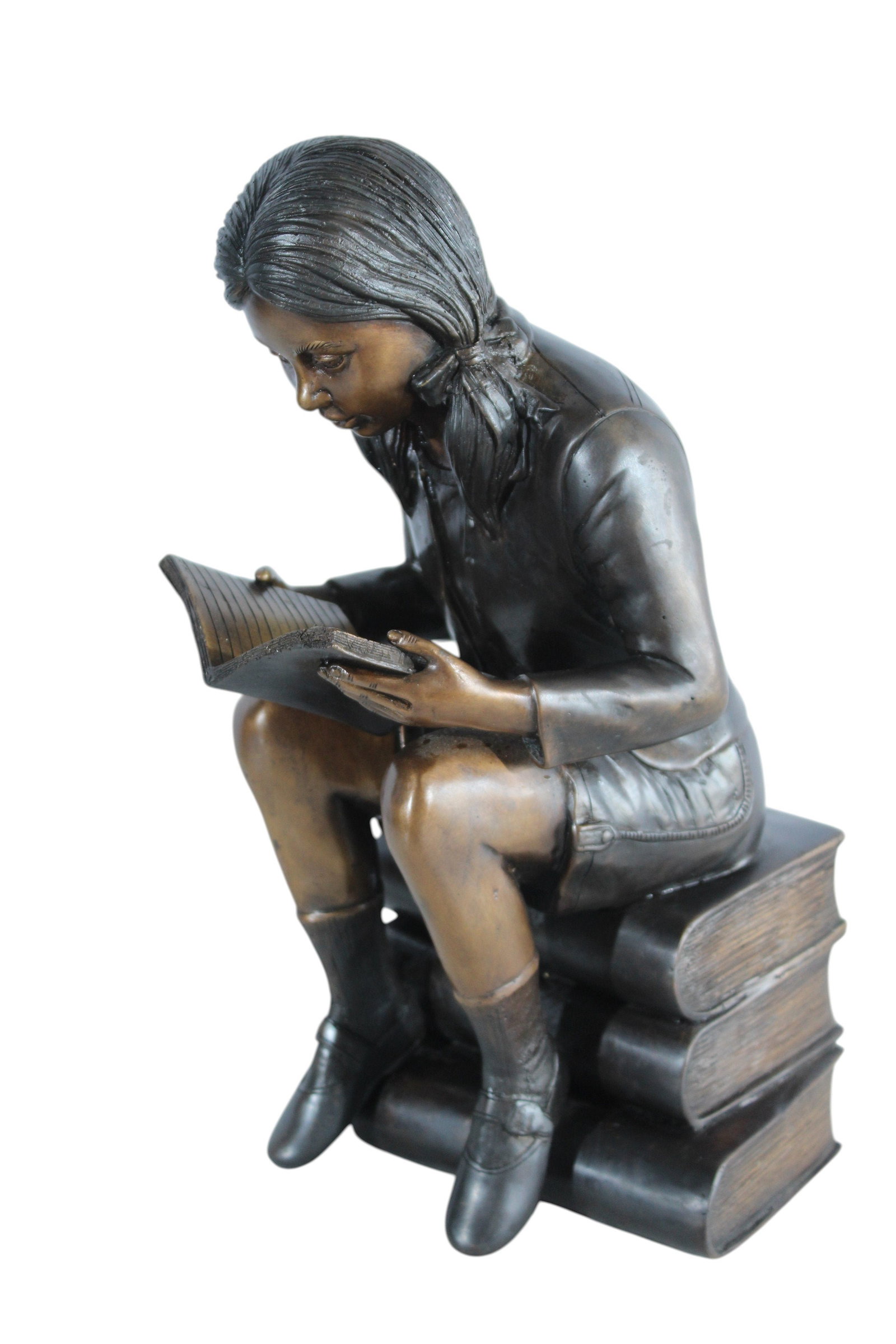 Bronze Girl Reading Statue on Book Stack Library Sculpture Art 8" x 6" x 15"H: Celebrate the love of reading with this bronze statue of a girl seated on a stack of books, fully absorbed in a favorite story. Fine sculpted details in the hair, clothing, and open pages are finished