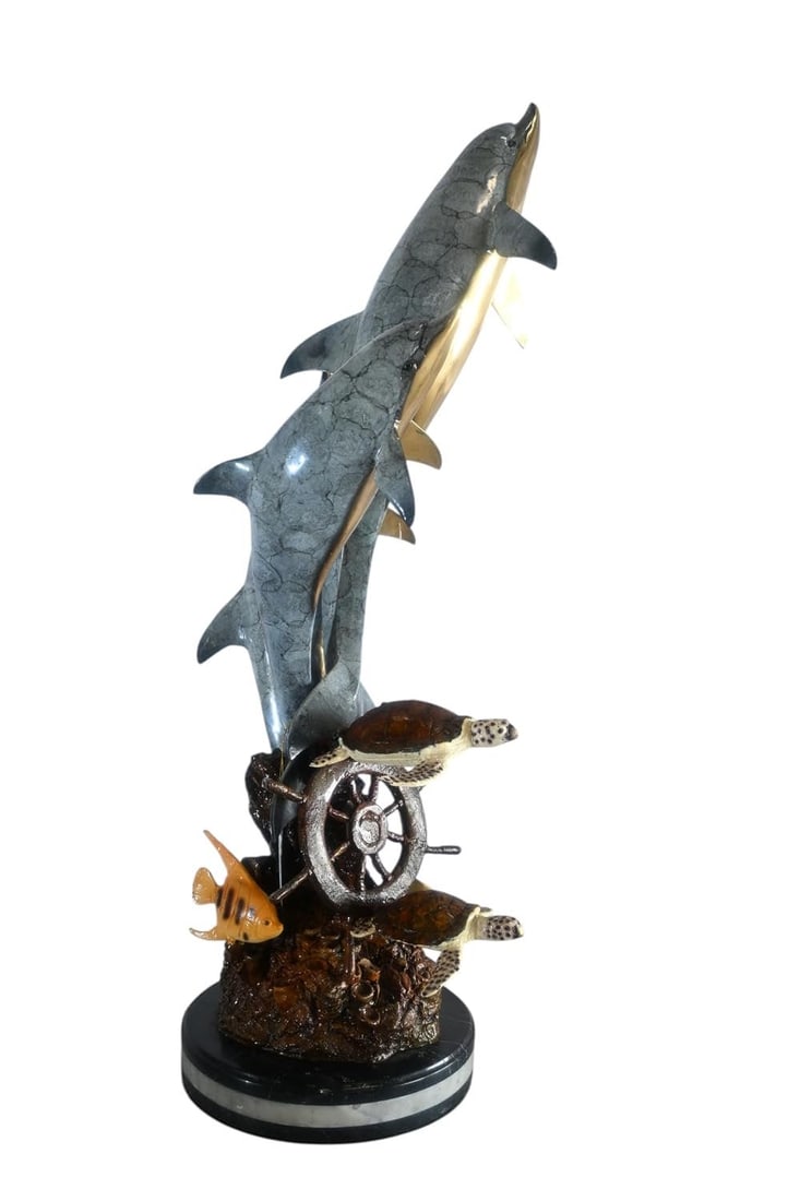 Bronze Three Dolphins Leaping Sculpture Lost Wax Casting 15"x12"x40"H: This striking bronze sculpture captures the joy and grace of three dolphins leaping skyward in a dynamic twisting composition above a vibrant ocean reef. Sea turtles tropical fish and richly detailed 