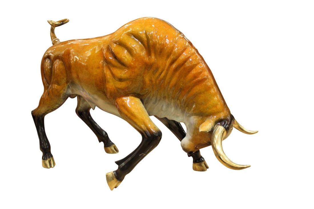 Bull Heads Down -Large Bronze Statue - Size: 48"L x 12"W x 30"H.: This large bronze sculpture depicts a wall street Bull. He bends down keeping his hind legs on high dry ground just in case anything decides to attack or he needs to get out of the lake in a jiffy. Hi