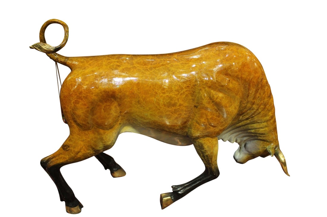 Bull Heads Down Small Bronze Statue - Size: 24"L x 6"W x 16"H.: This bronze sculpture depicts a wall street Bull. He bends down keeping his hind legs on high dry ground just in case anything decides to attack or he needs to get out of the lake in a jiffy. His horn