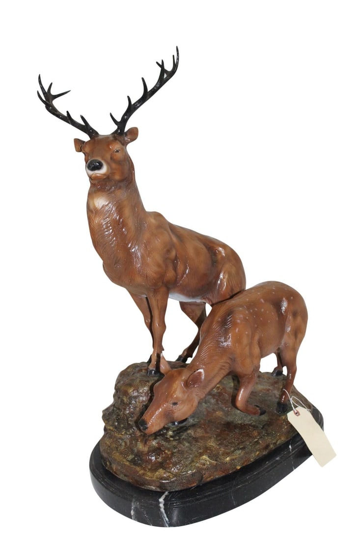 Two Deers Bronze Statue - Size: 21"L x 13"W x 32"H.: This beautiful bronze sculpture of two deer will impress any visitors to your home. The elegance of the older deer standing proud and majestically in contrast to the sweet innocence of it's fawn will 