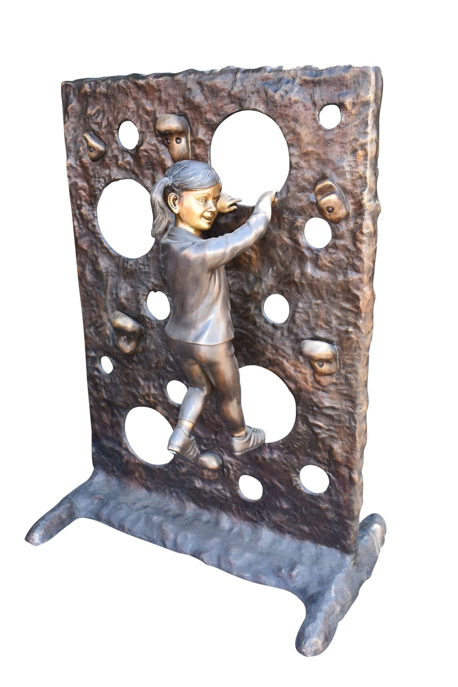 Young Girl Playing on A Climbing Wall Bronze Statue Life Size 44" x 26" x 57"H: This is an incredible statue of life size child playing on a climbing wall in the playground. The artist was detailed in his representation of the sculpture, highlighting each part with lines engraved