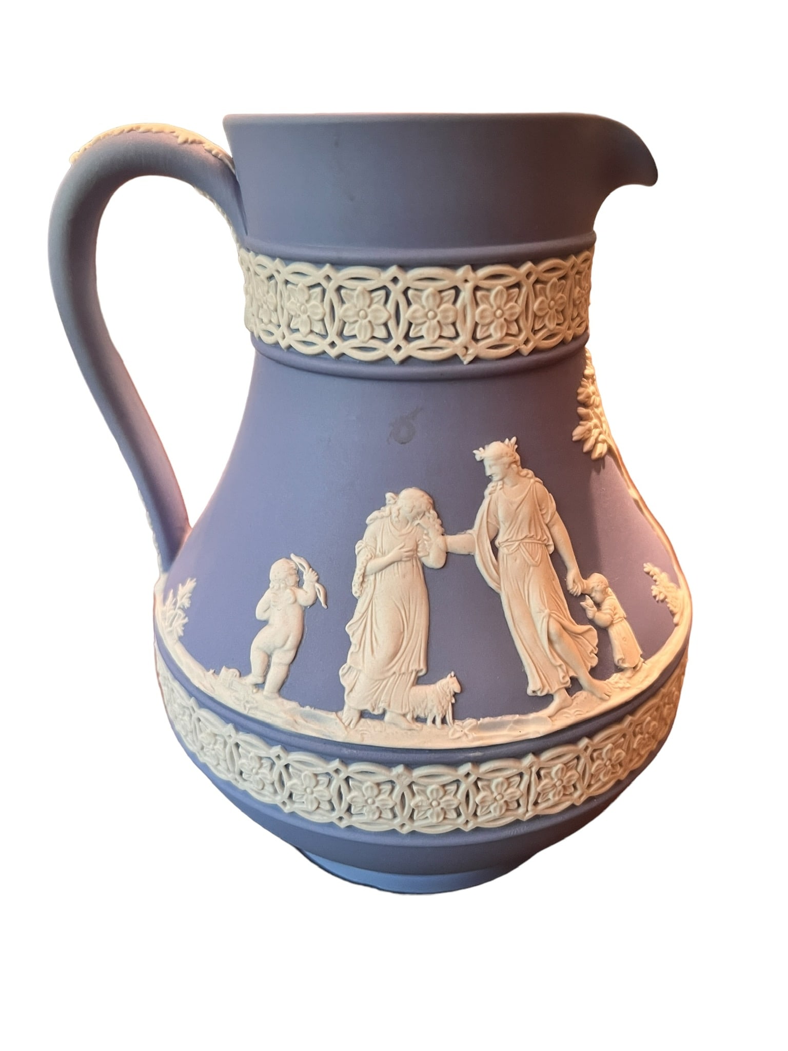 Medium Wedgwood Jasperware (Blue White) Pitcher: Medium Wedgwood Jasperware blue and white pitcher 5 inches tall by 5 inches handle the spout. Location: Dining Room. ****** Please review all photos for further information & description. All measurem