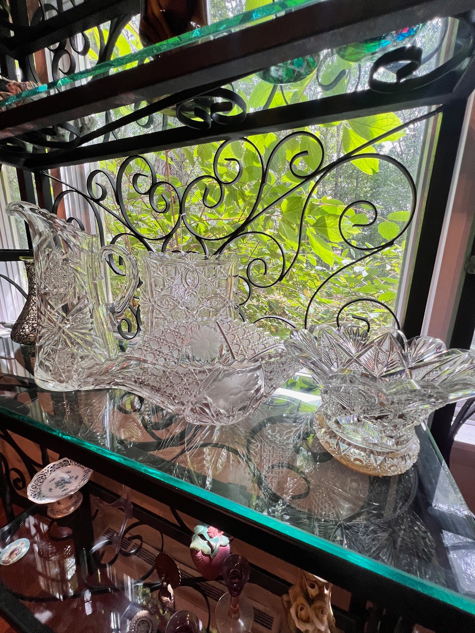 Lot of 4 Cut Crystal Glass Serveware: Lot of 4 cut Crystal or Glass serve ware. One cut glass pitcher is 11 inches tall by 6.5 inches, one square plate is 7 inches x 7 inches, one long cut glass bowl 14 inches long by 8 inches wide by 4 i