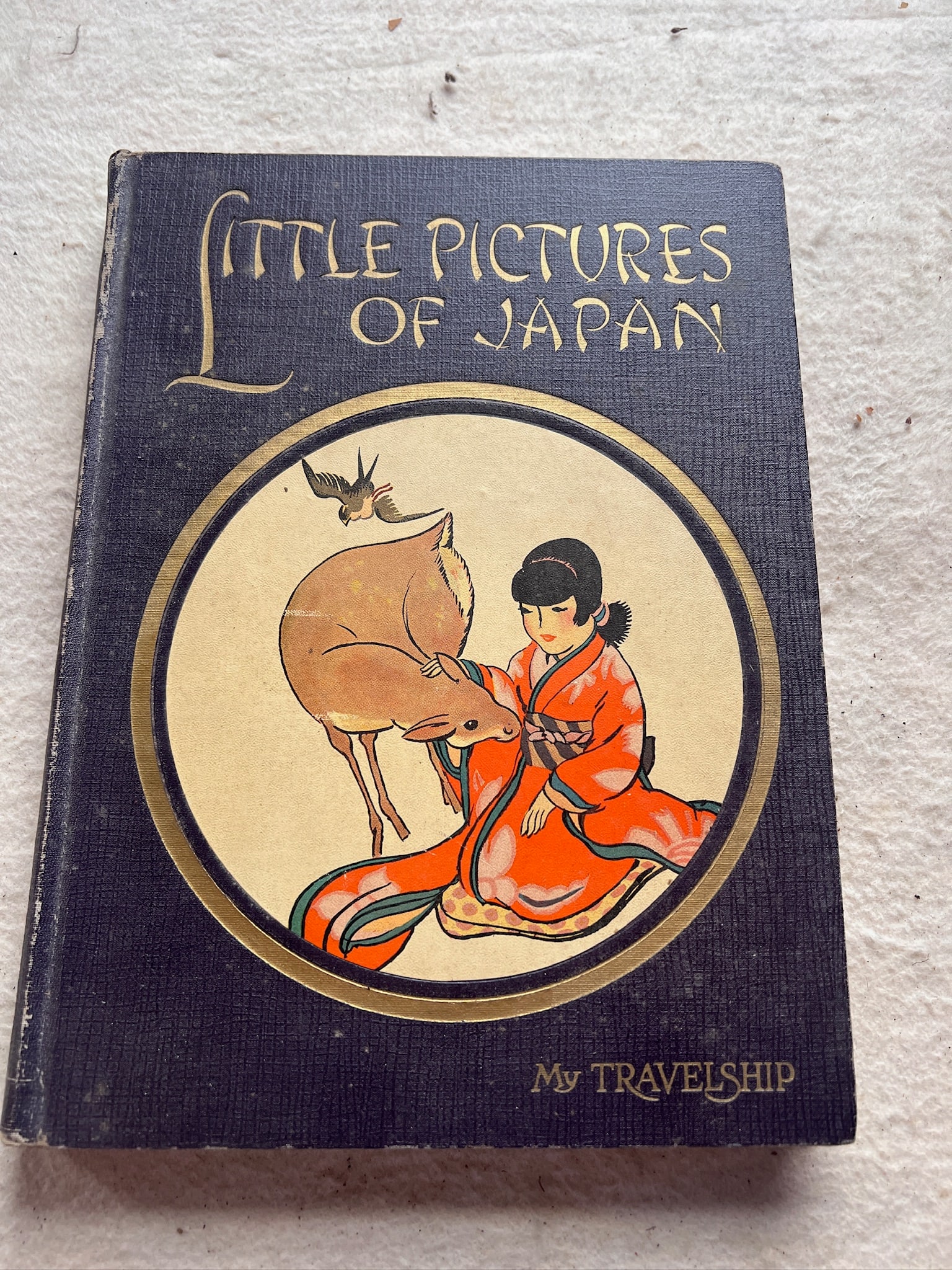 1925 Book Little Pictures of Japan: 1925 Book Little Pictures of Japan. Book is in good condition with minor scuffs at cover and spine. Beautiful images with bright colors. Katharine Sturges, illustrator; Edited by Olive Beaupre Miller.