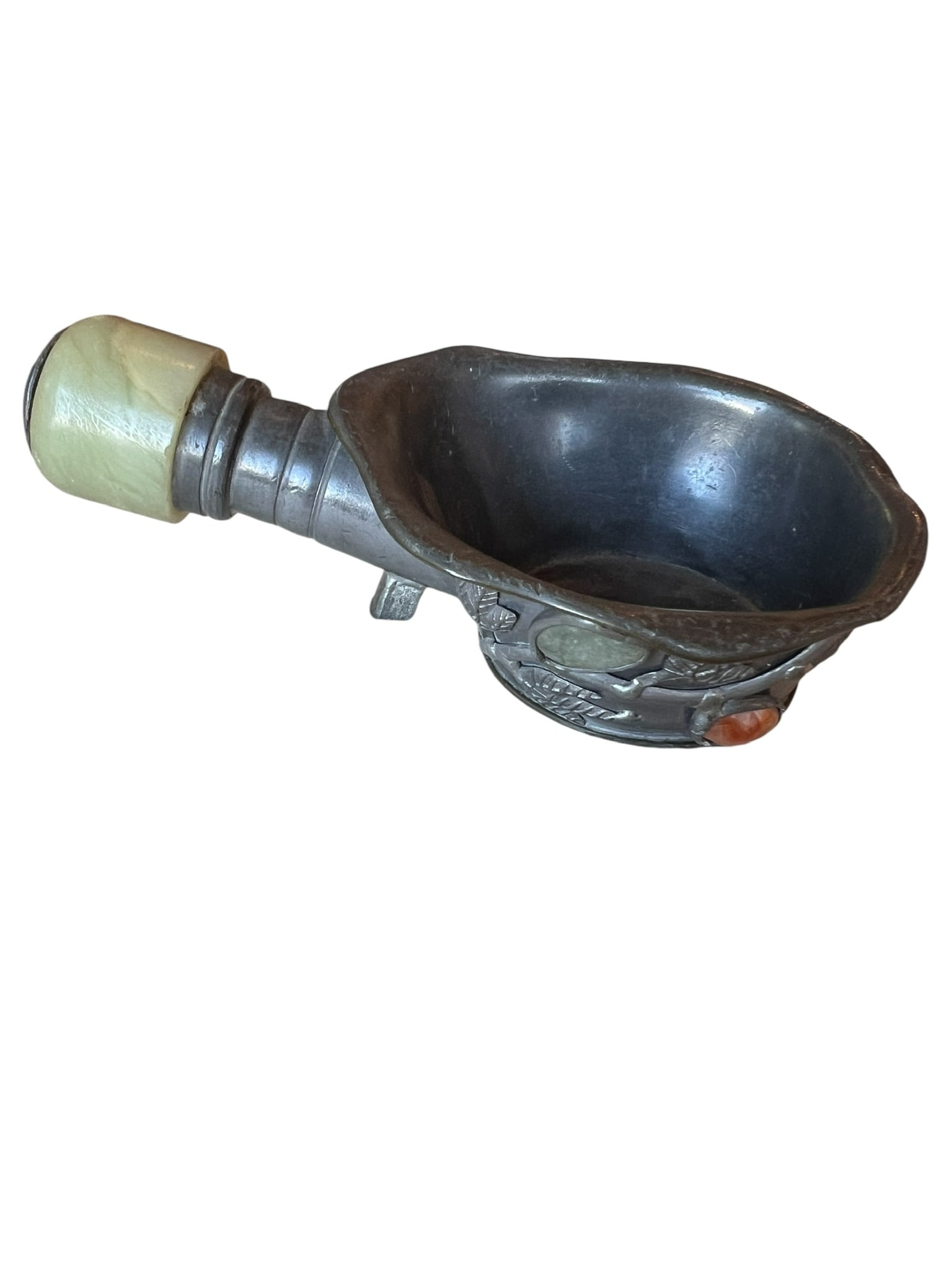 Pewter Chinese Silk Iron: Pewter Chinese Silk Iron or Pan Iron. Iron is pewter and has several gemstone cabochons with jade handle. Handle has a crack in the jade but is solid and not moving. 6.5 inches long x 3.5 inches wide