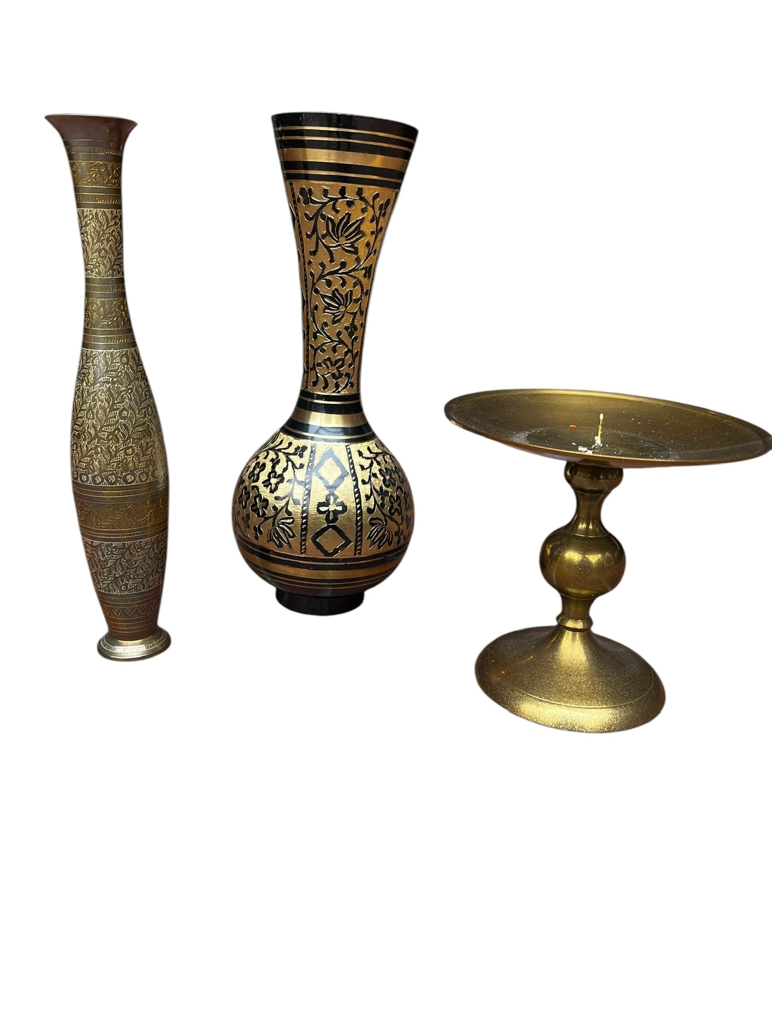 Lot of Brass Decorative Objects: Lot of Brass decorative objects. Lot includes 3 brass objects 1 6 inches tall brass candle pedestal, 1 vase with floral tooling 12 inches tall. 1 tall bulbous vase 12 inches tall.In-House shipping ava