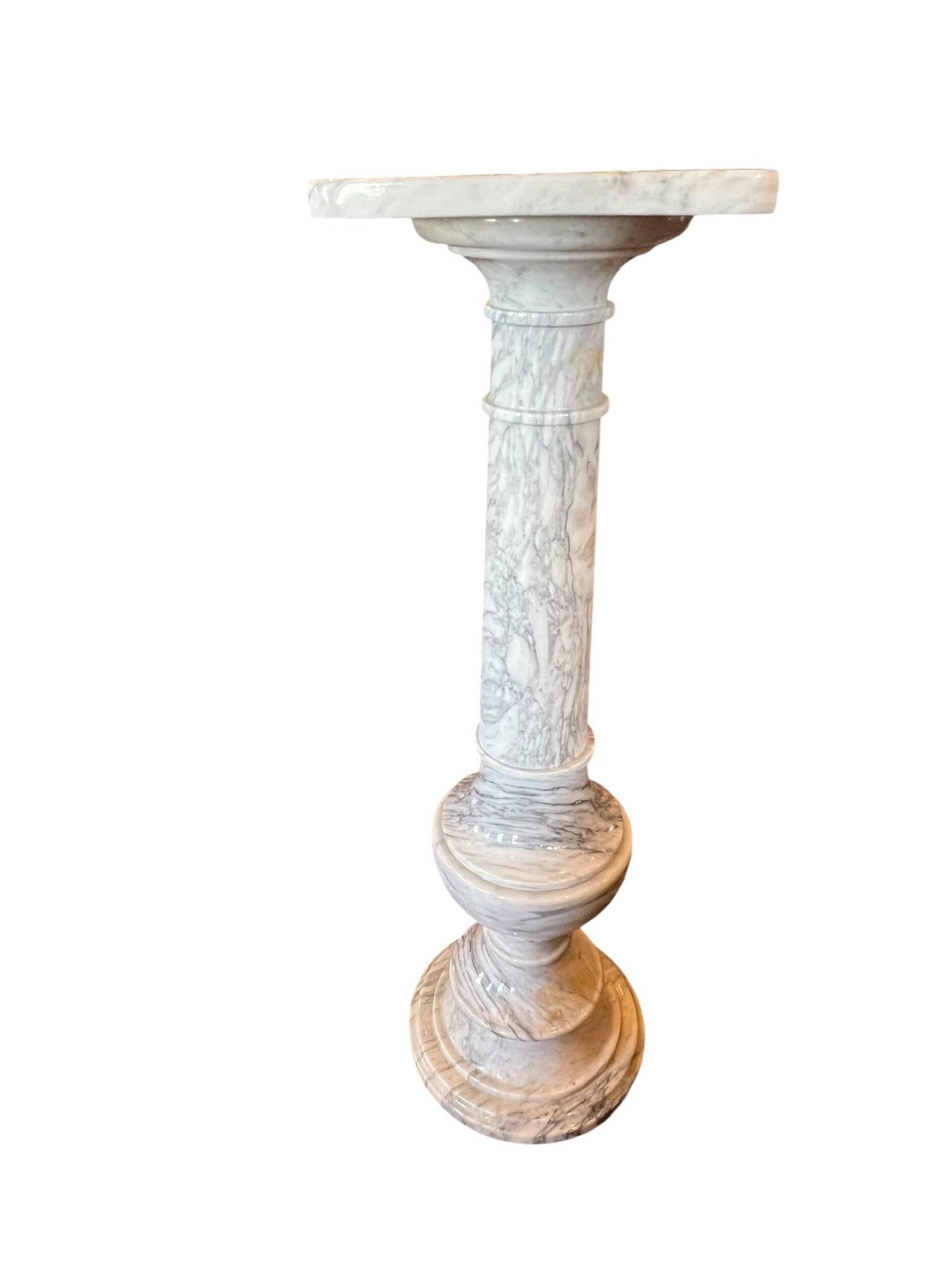 White Marble Pedestal: White marble pedestal with removable top. Marble is in excellent condition and measures 35.5 inches tall x 10 inches x 10 inches. This item is considered furniture and will not be shipped via In-House
