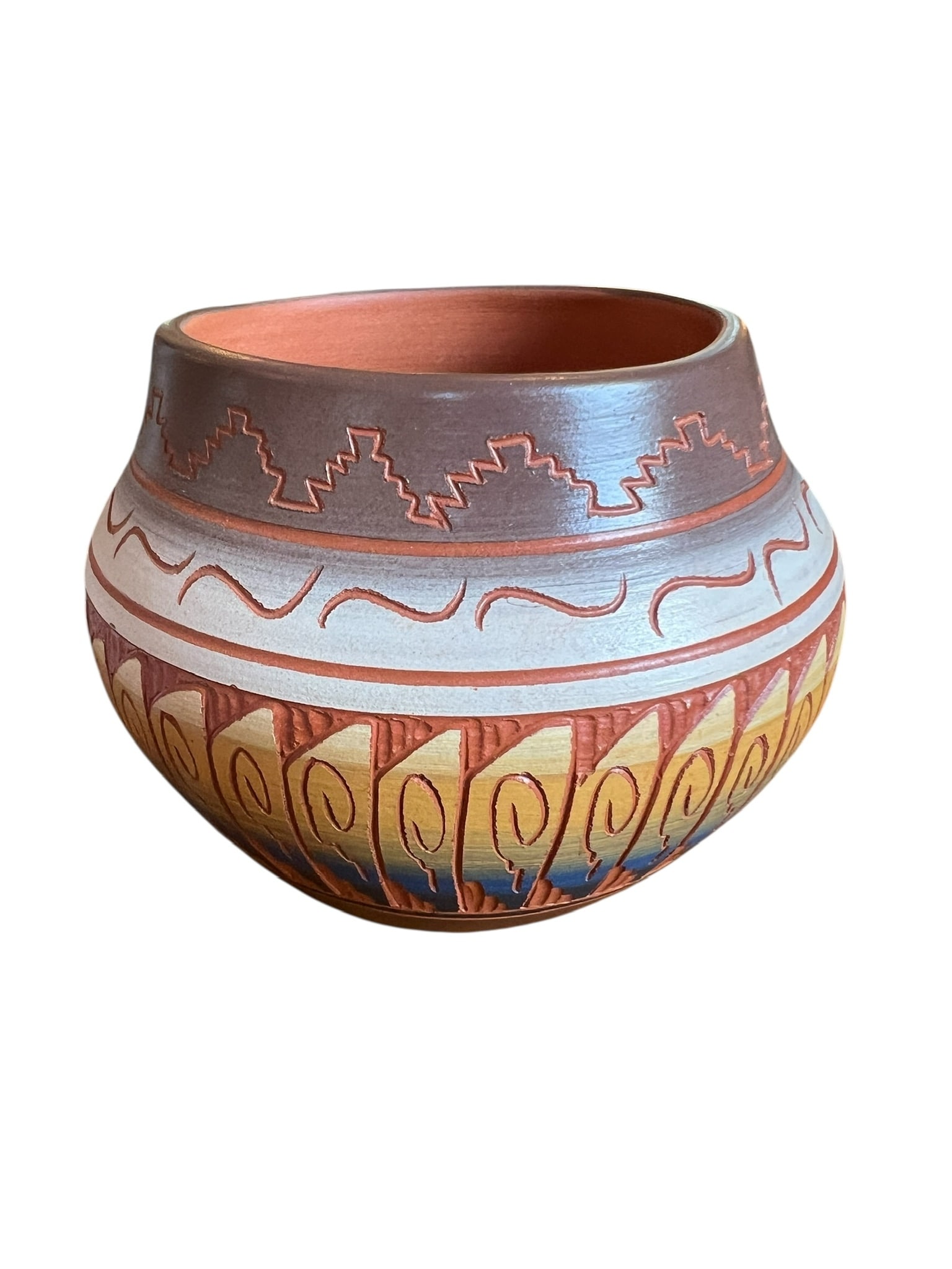 Squat Navajo Pottery Vase by Vanessa Charlie: Squat Navajo Pottery Vase by Vanessa Charlie. Wonderful bands of color showcase the intricate designs carved into the clay. With the color and craftmanship, you can see the southwest landscape when lo