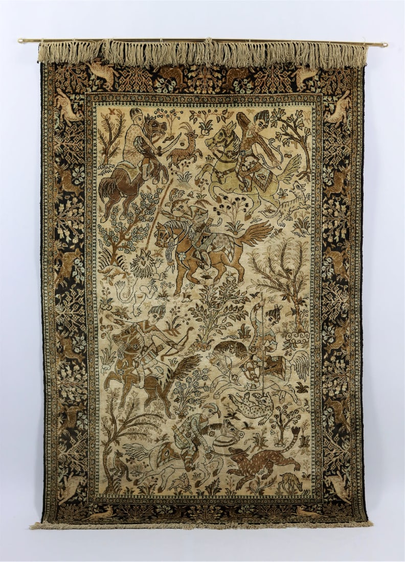 A silk Gohm carpet with hunting scenes, 20th Century (1 of 3)