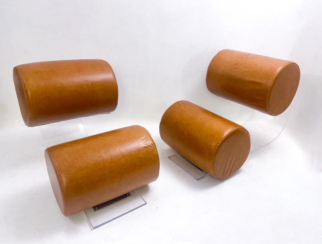 A Pair of Cognac Armchairs by Marzio Cecchi, Plexiglas and Leather, 1970: The Mid-Century Modern Pair of Cognac Armchairs by Marzio Cecchi, designed in the 1970s, are a striking example of the innovative design trends of the period. These armchairs feature a unique combinat