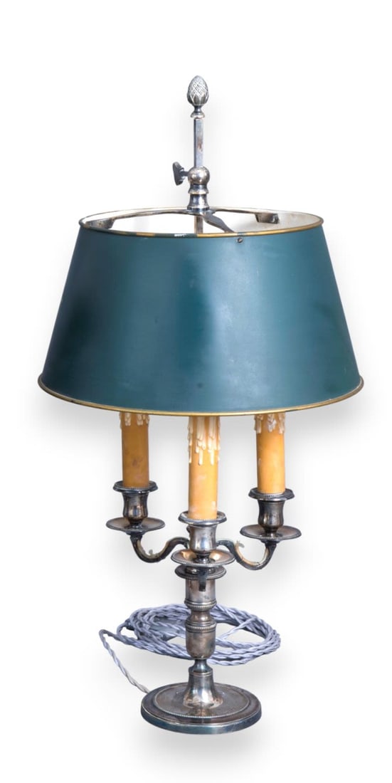 A silver plated bouillotte three-light lamp by Maison Charles, 20th Century: Stamped with CF hallmark for "Charles France" width34 cm height62 cm