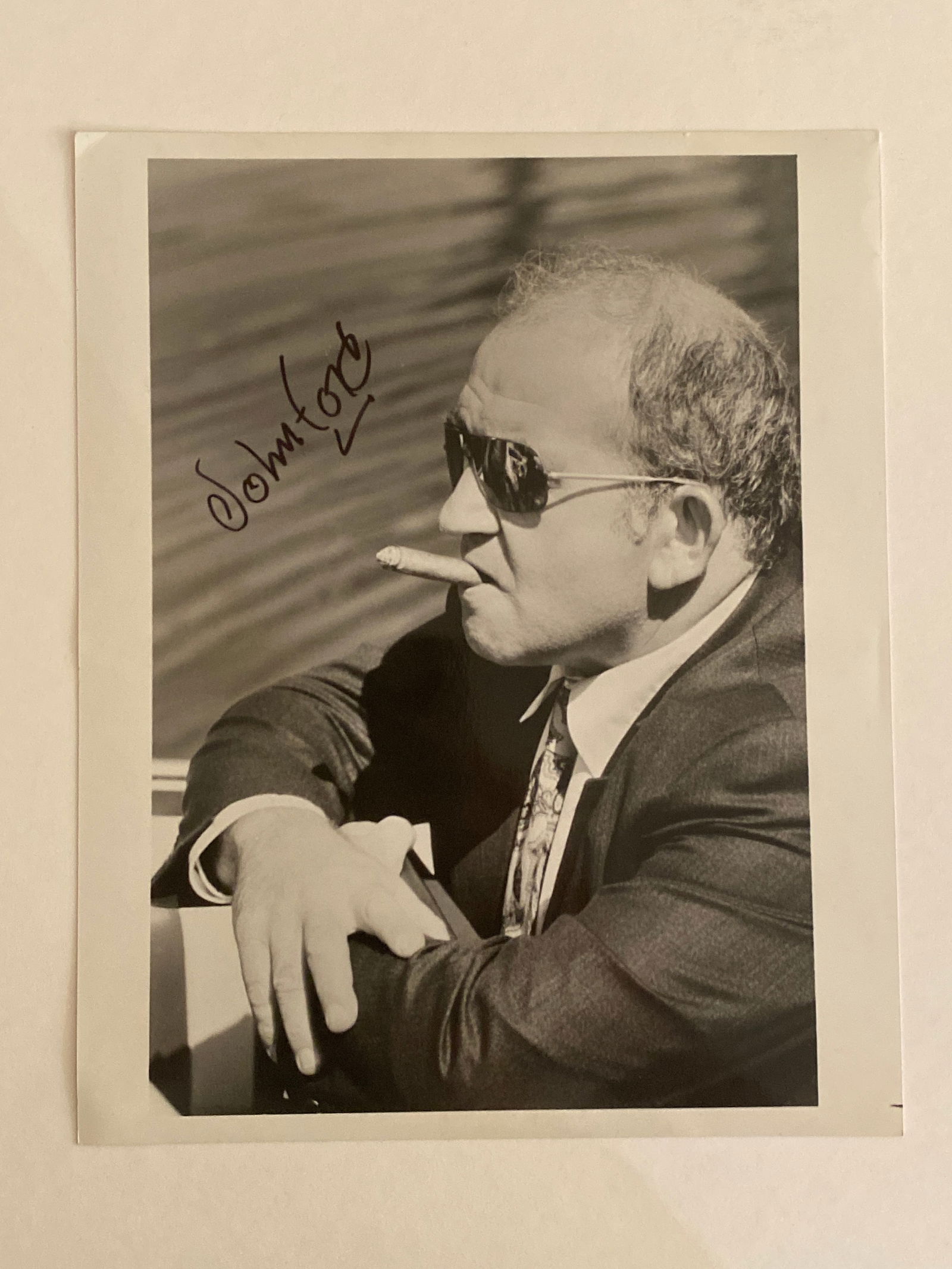 John Ford Autographed Photo: This rare and collectible John Ford autographed photo offers a unique opportunity for film history enthusiasts to own a piece of cinematic legacy. Ford, an iconic filmmaker known for directing classic