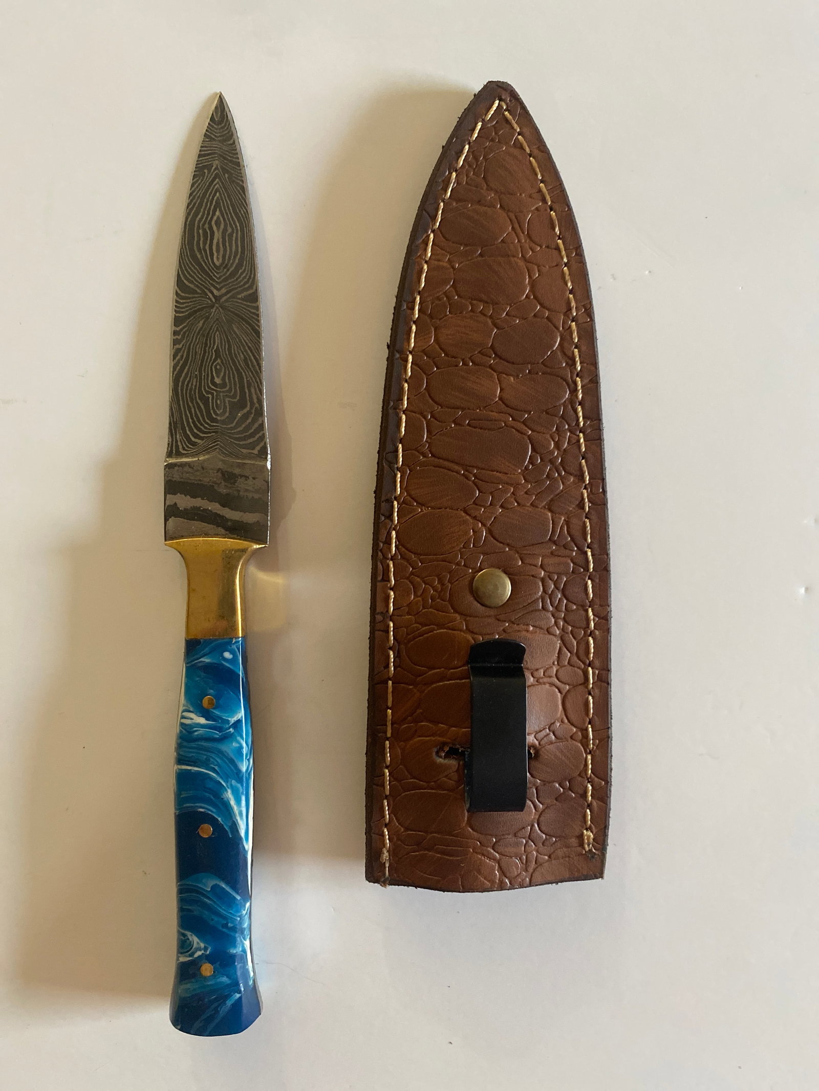 Custom Hand Made Damascus Steel Knife: Discover exceptional craftsmanship with this exclusive liquidation sale of hand-made knives from MHS Cutlery. Renowned for precision, durability, and artisan quality, these knives are perfect for coll