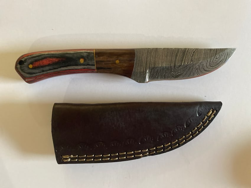 Custom Hand Made Damascus Steel Knife: Discover exceptional craftsmanship with this exclusive liquidation sale of hand-made knives from MHS Cutlery. Renowned for precision, durability, and artisan quality, these knives are perfect for coll