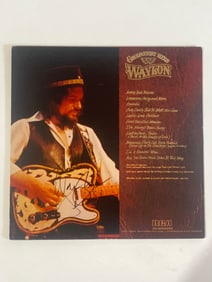 Waylon Jennings autographed record album