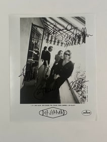 Def Leopard autographed photo