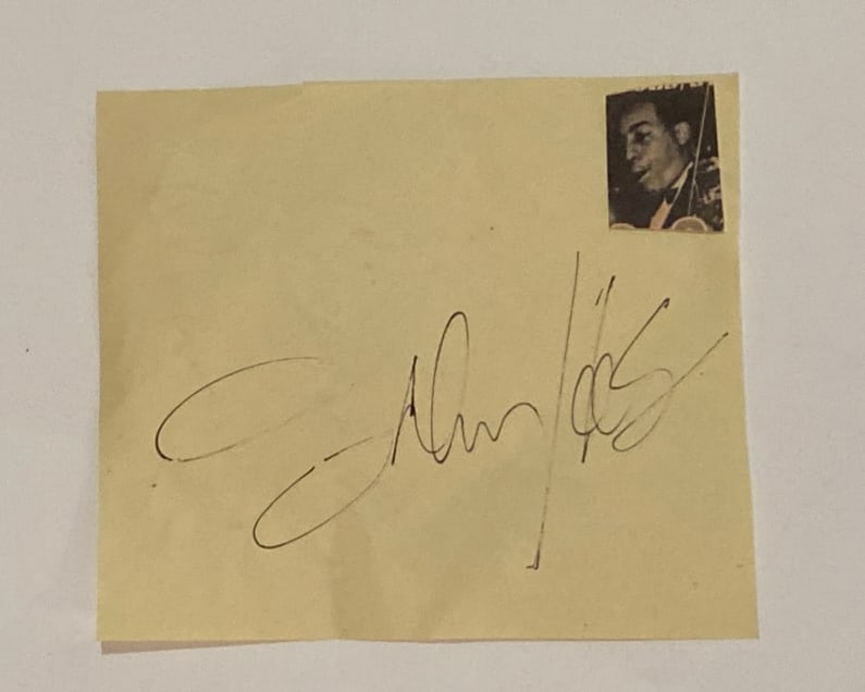 Johnny Hodges autographed paper: This vintage autograph features the bold signature of legendary jazz saxophonist Johnny Hodges, best known for his long-standing collaboration with Duke Ellington and his smooth, lyrical alto saxophon