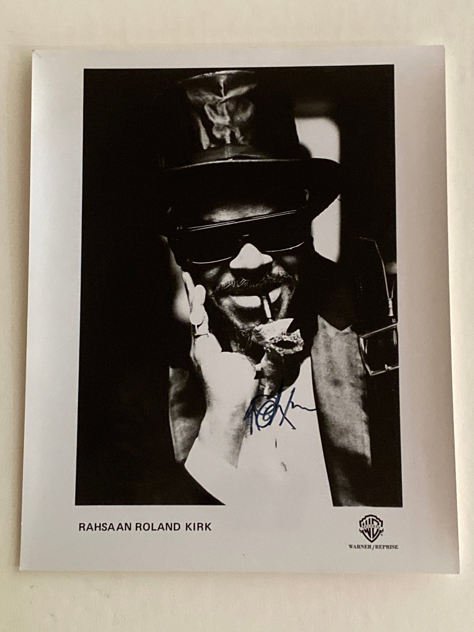 Roland Kirk Autographed Photo: Offered here is a rare autographed photo of the legendary jazz multi-instrumentalist Roland Kirk, known for his mesmerizing ability to play multiple wind instruments simultaneously and his boundary-pu